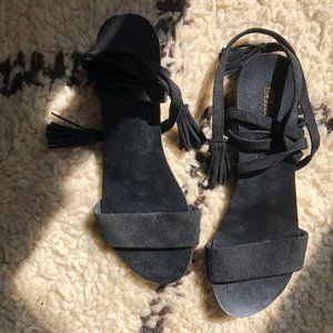 Black flats with ankle ties
